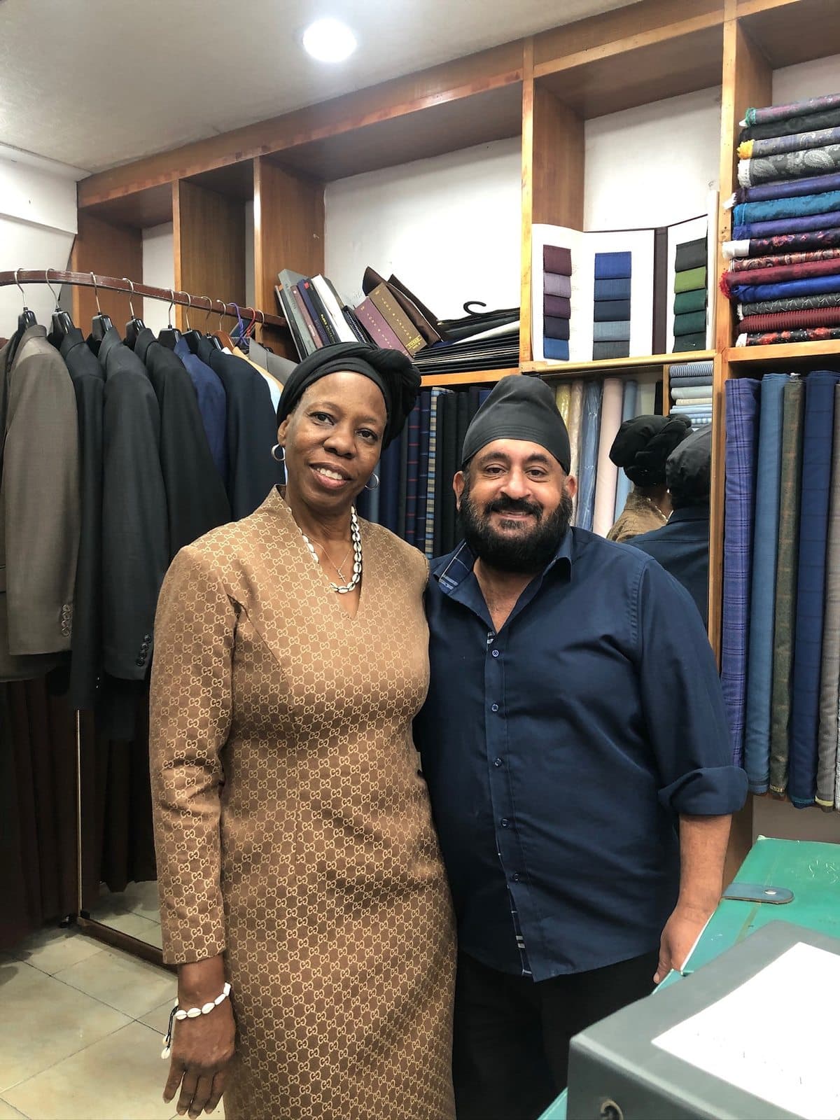 Regal Fashion tailor with a client fitted in a custom suit, Bang Rak, Bangkok