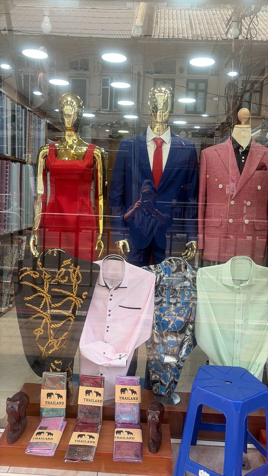 Client fitting photo inside the Bang Rak tailoring shop